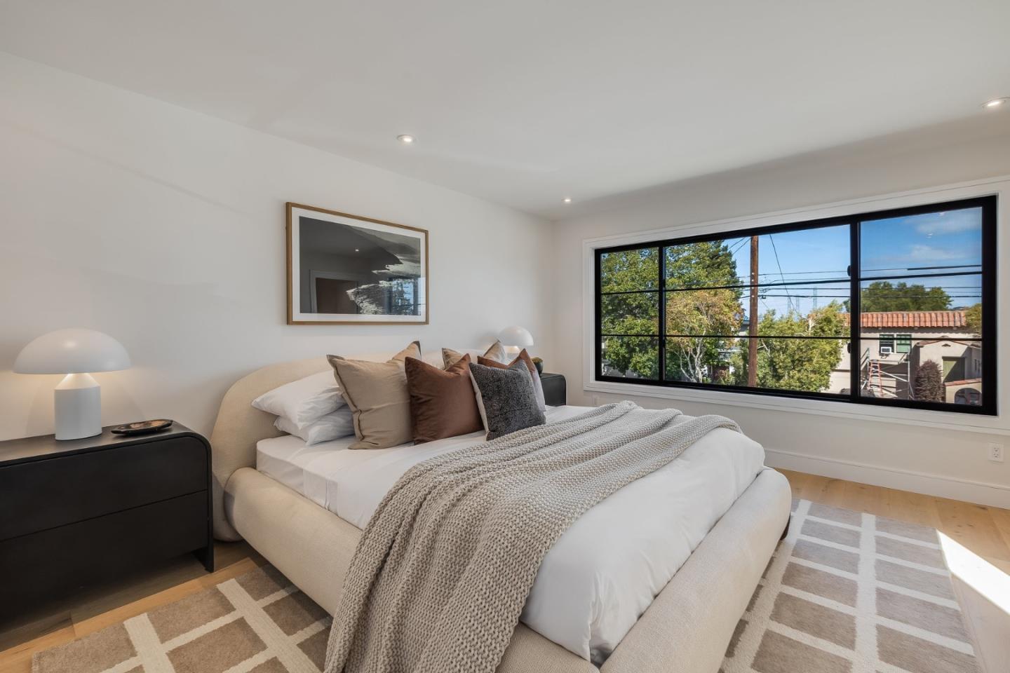 139 Victoria Road Burlingame, CA 94010 - Photo 43 of 72 a bedroom with a large bed and a large window