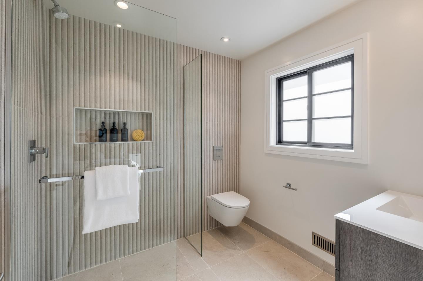 139 Victoria Road Burlingame, CA 94010 - Photo 53 of 72 a bathroom with a toilet a sink a shower and mirror