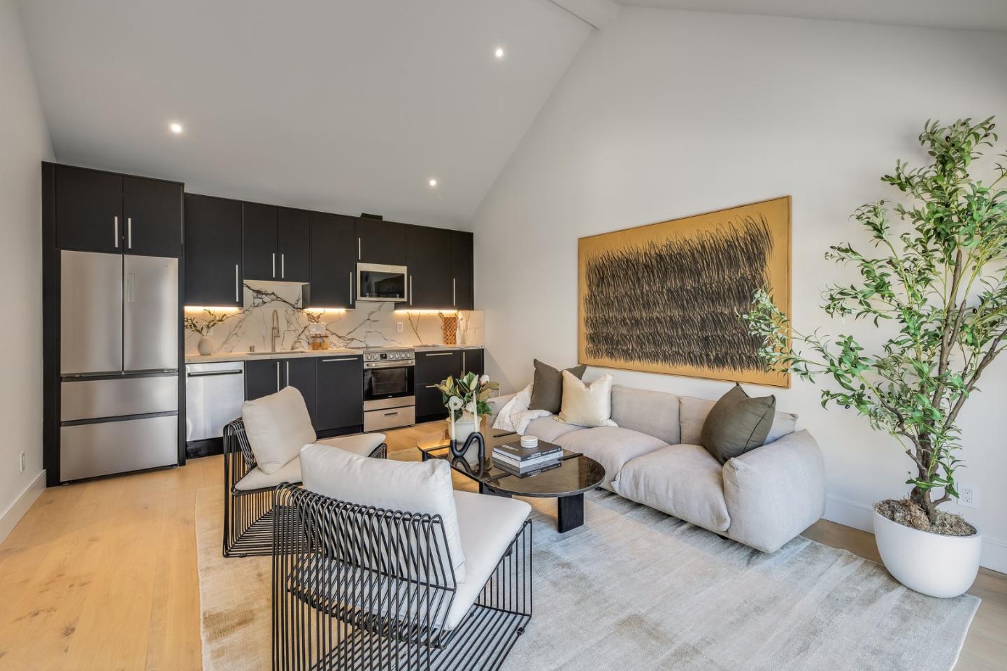 139 Victoria Road Burlingame, CA 94010 - Photo 59 of 72 a living room with furniture and a potted plant