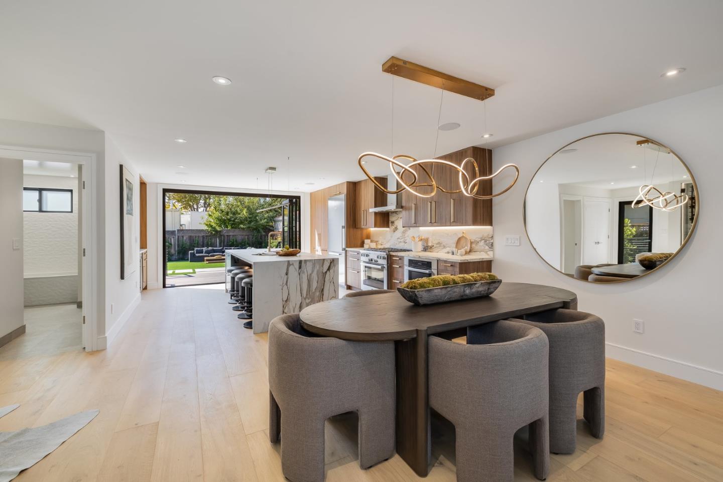 139 Victoria Road Burlingame, CA 94010 - Photo 7 of 72 a living room with furniture and a wooden floor