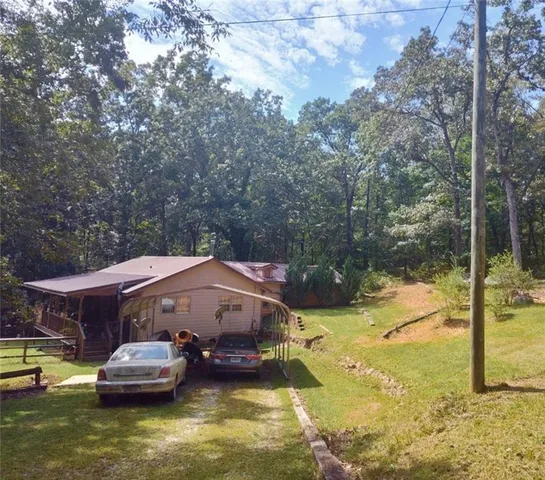 a aerial view of a house with swimming pool