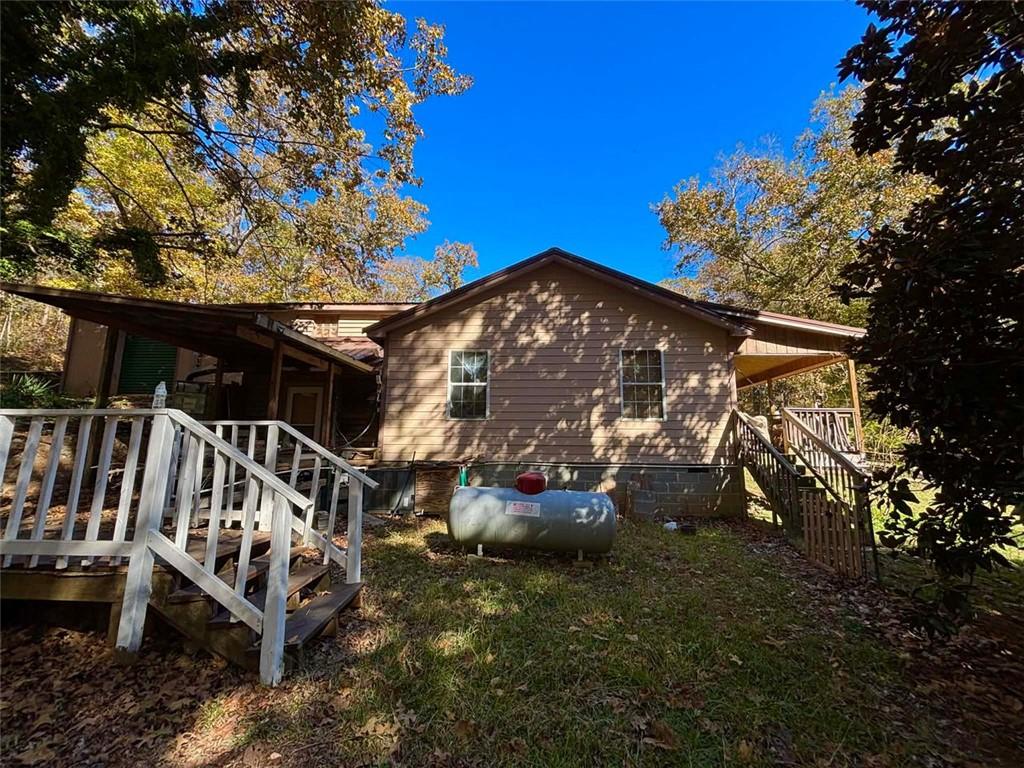 80 Beaver Run Road Waco, GA 30182 - Photo 9 of 17 a view of a house with a yard