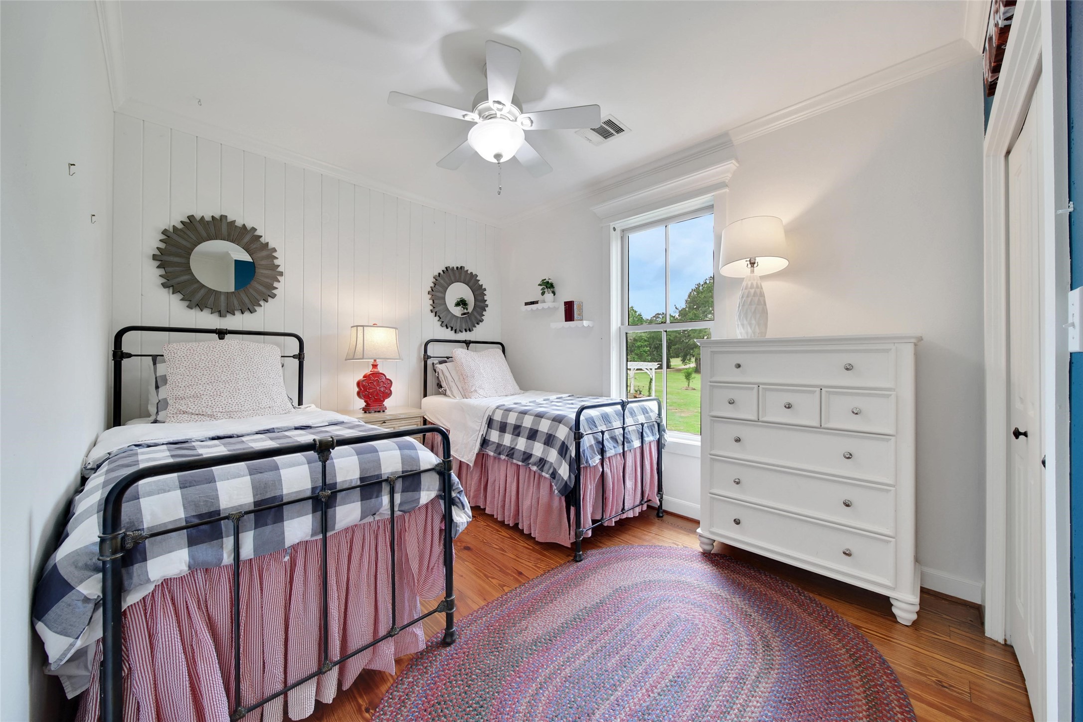 18875 Rabon Chapel Road Montgomery, TX 77316 - Photo 24 of 45 a bedroom with two beds and a baby crib