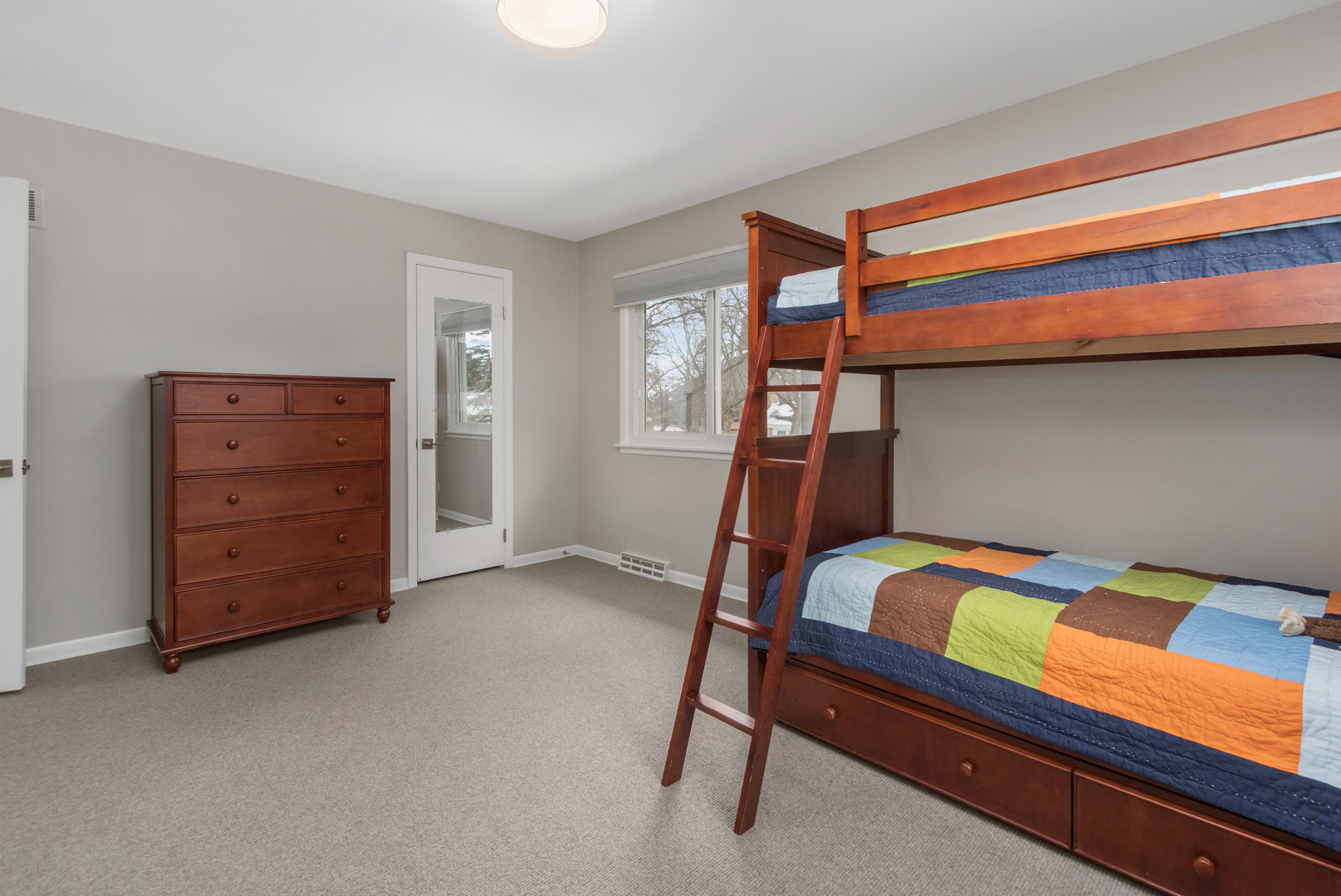 29 Ellendale Road Deerfield, IL 60015 - Photo 16 of 35 a bedroom with a bed and furniture