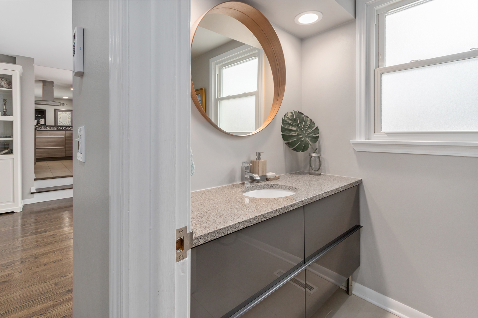 29 Ellendale Road Deerfield, IL 60015 - Photo 4 of 35 a bathroom with a sink and a mirror