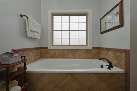 a bathroom with a bathtub