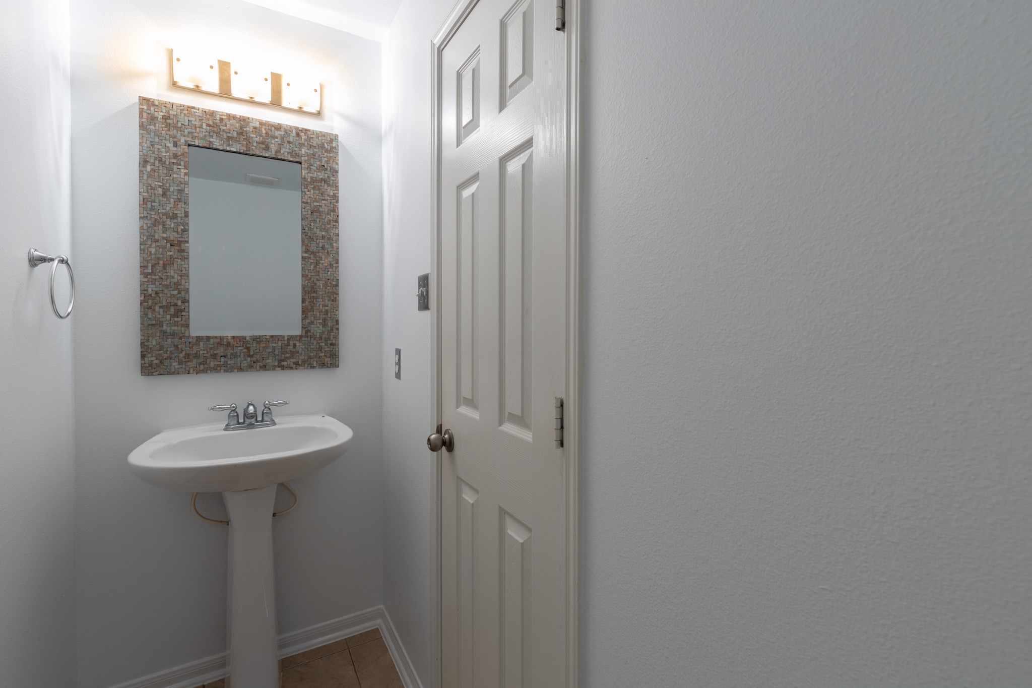 6727 Montay Bay Drive Spring, TX 77389 - Photo 14 of 41 a bathroom with a sink and a mirror