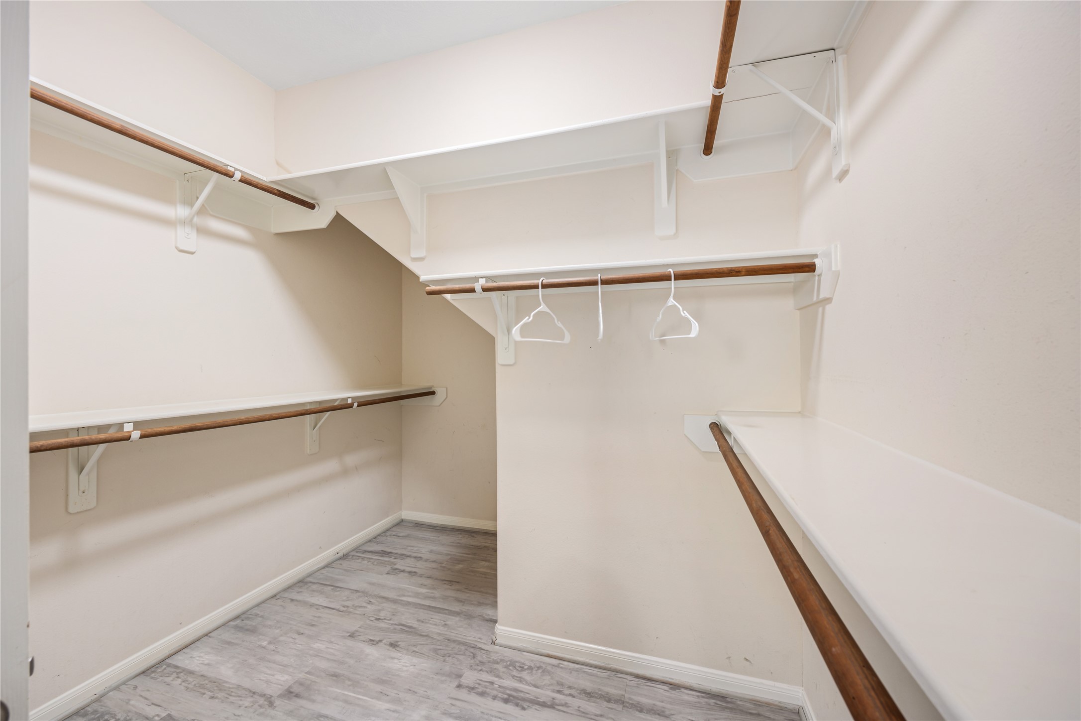 6727 Montay Bay Drive Spring, TX 77389 - Photo 22 of 41 a view of an empty walk in closet