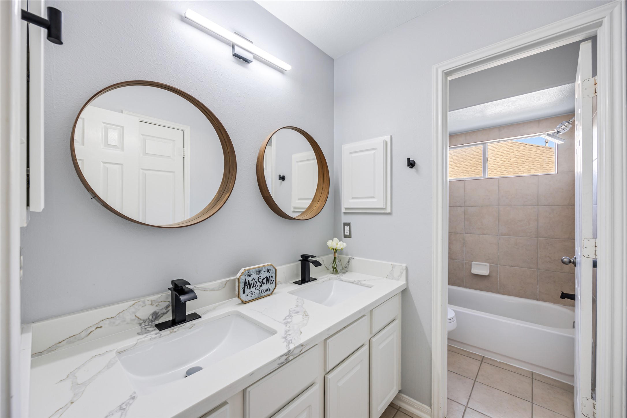 6727 Montay Bay Drive Spring, TX 77389 - Photo 26 of 41 a bathroom with a sink and a mirror