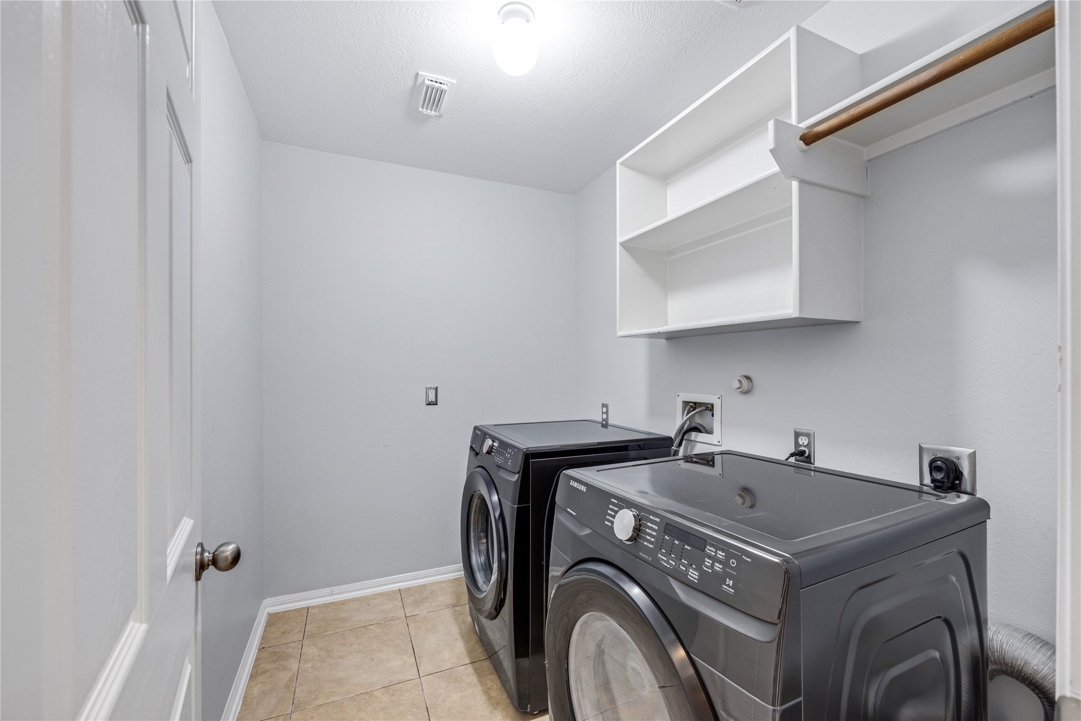 6727 Montay Bay Drive Spring, TX 77389 - Photo 31 of 41 a utility room with dryer and washer