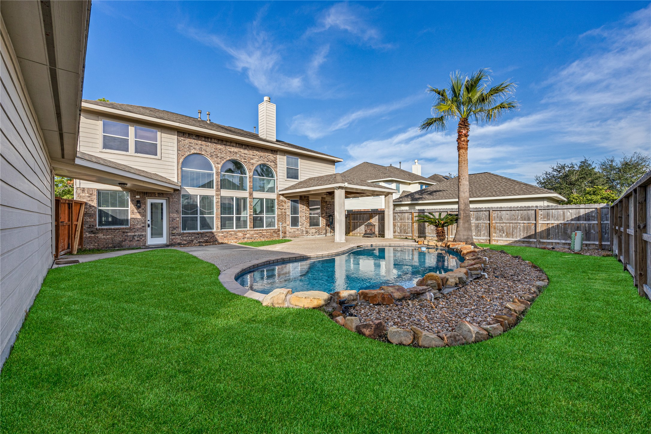 6727 Montay Bay Drive Spring, TX 77389 - Photo 33 of 41 a front view of house with yard and outdoor seating