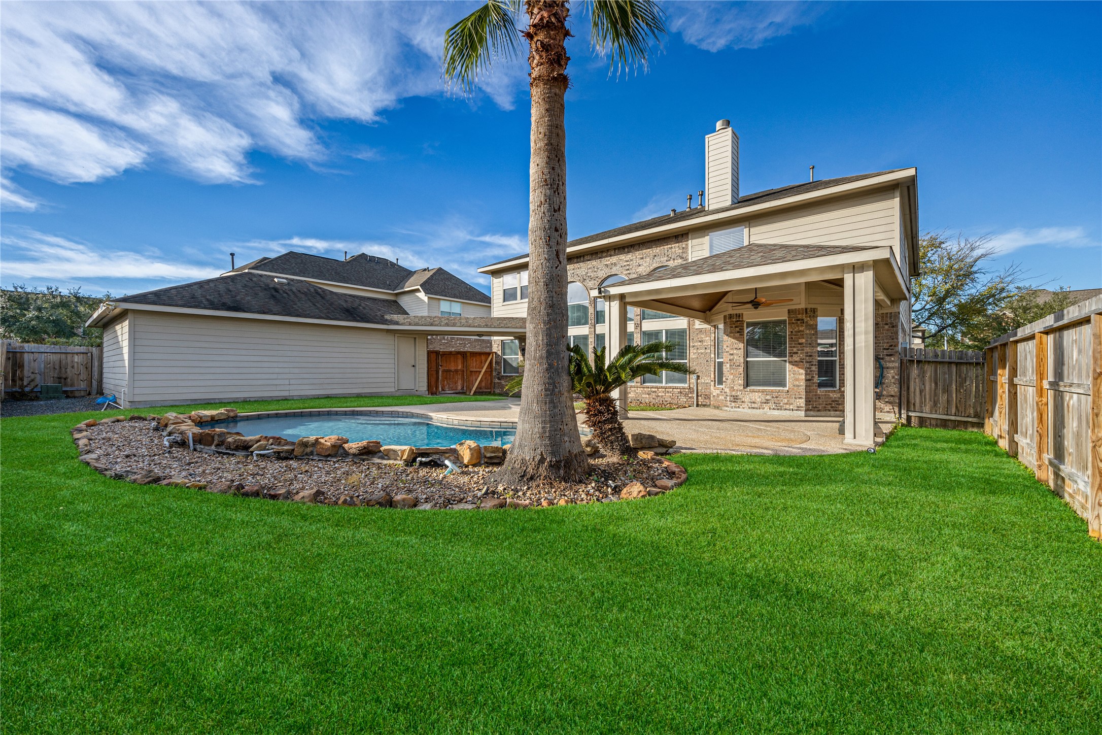 6727 Montay Bay Drive Spring, TX 77389 - Photo 35 of 41 a front view of a house with garden