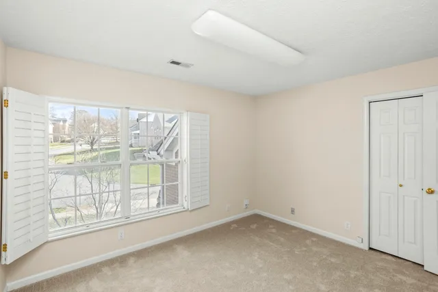 an empty room with windows