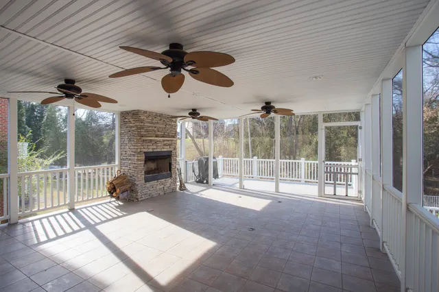 a view of livingroom with fireplace and window