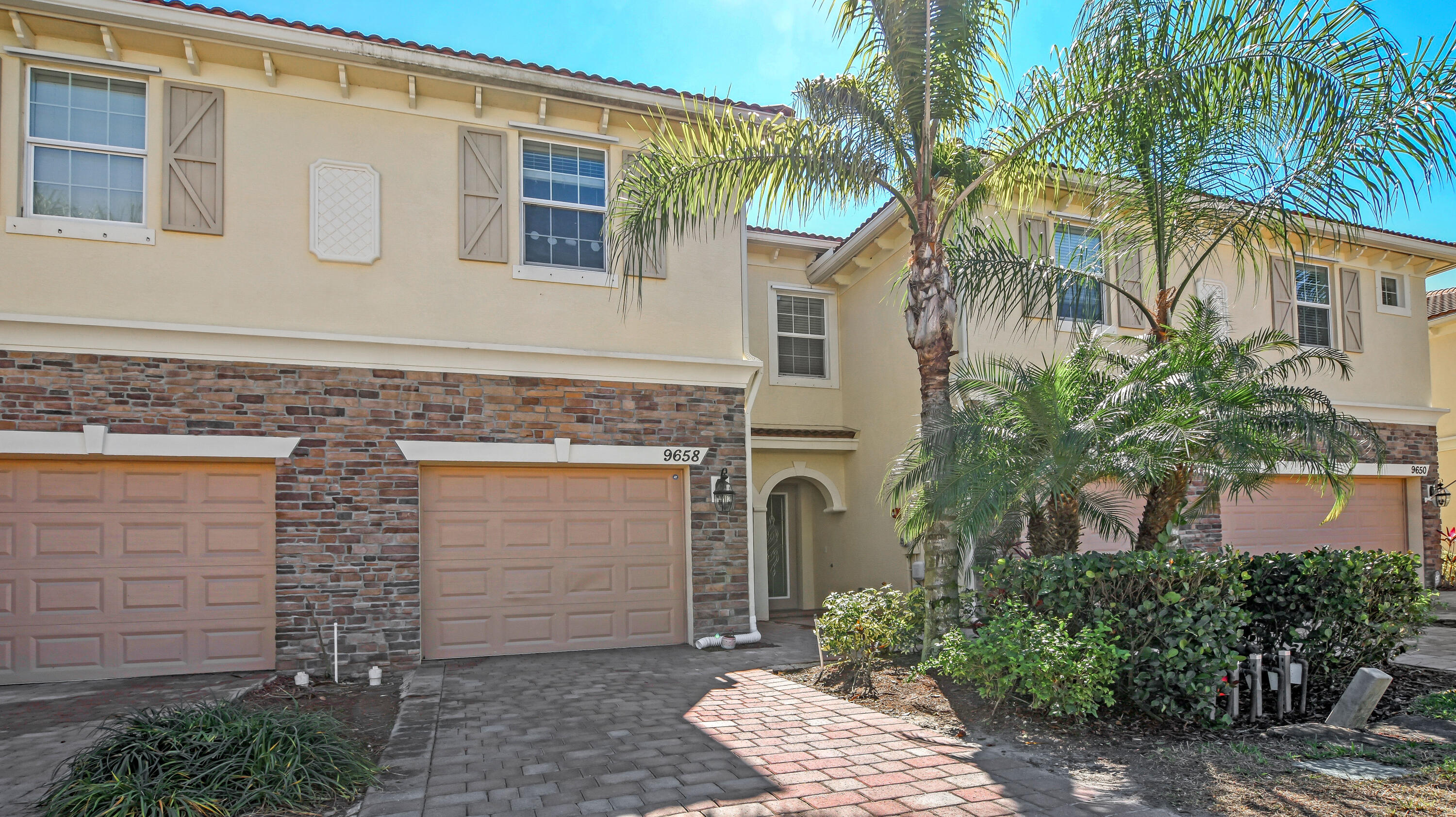 9658 Southwest Purple Martin Way Stuart, FL 34997 - Photo 2 of 35 Garage