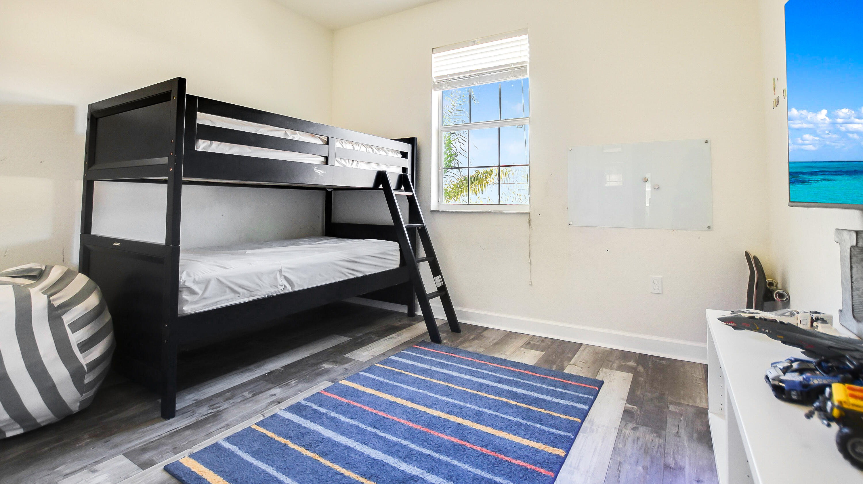 9658 Southwest Purple Martin Way Stuart, FL 34997 - Photo 24 of 35 Bedroom 3