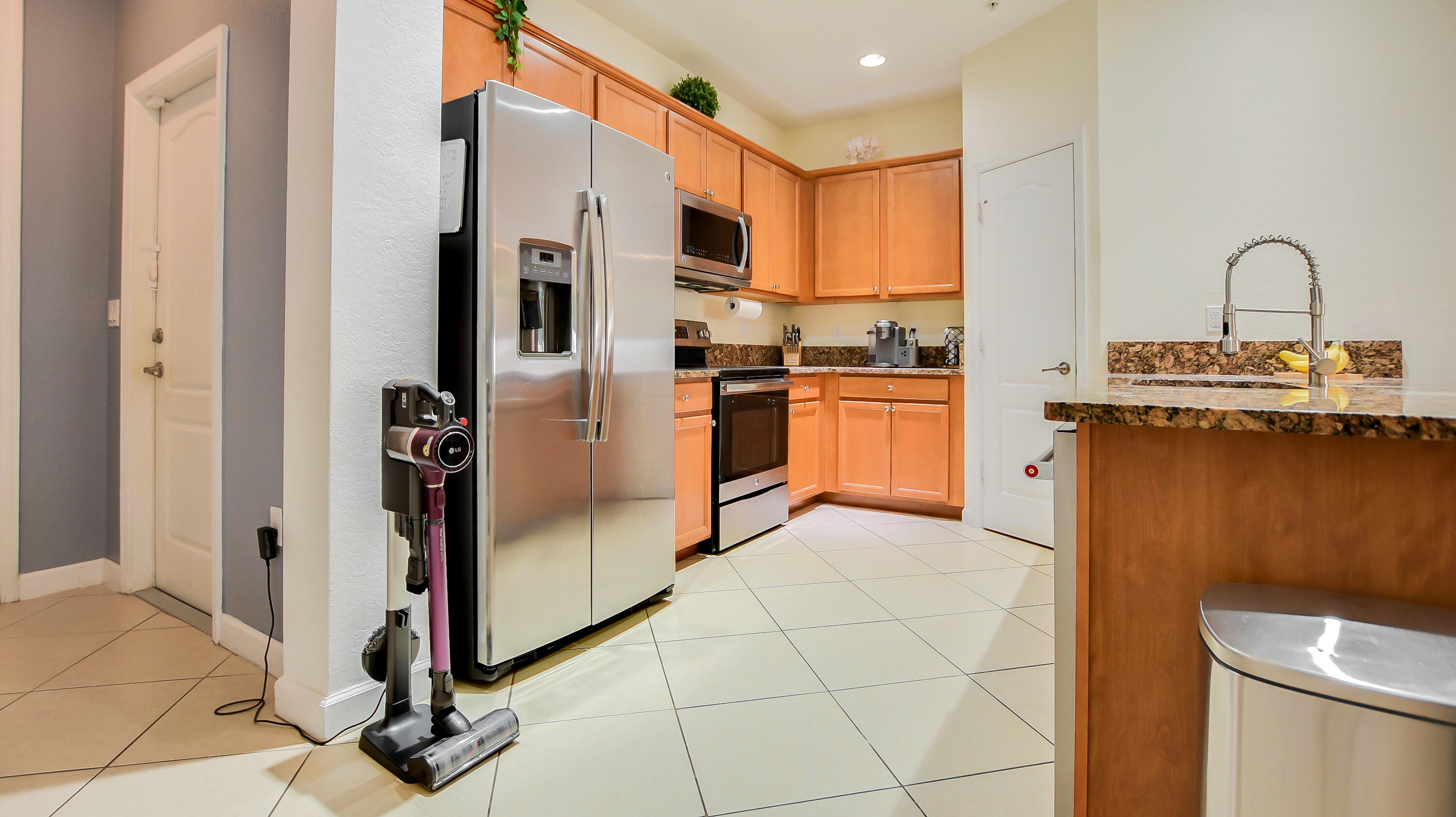 9658 Southwest Purple Martin Way Stuart, FL 34997 - Photo 4 of 35 Kitchen
