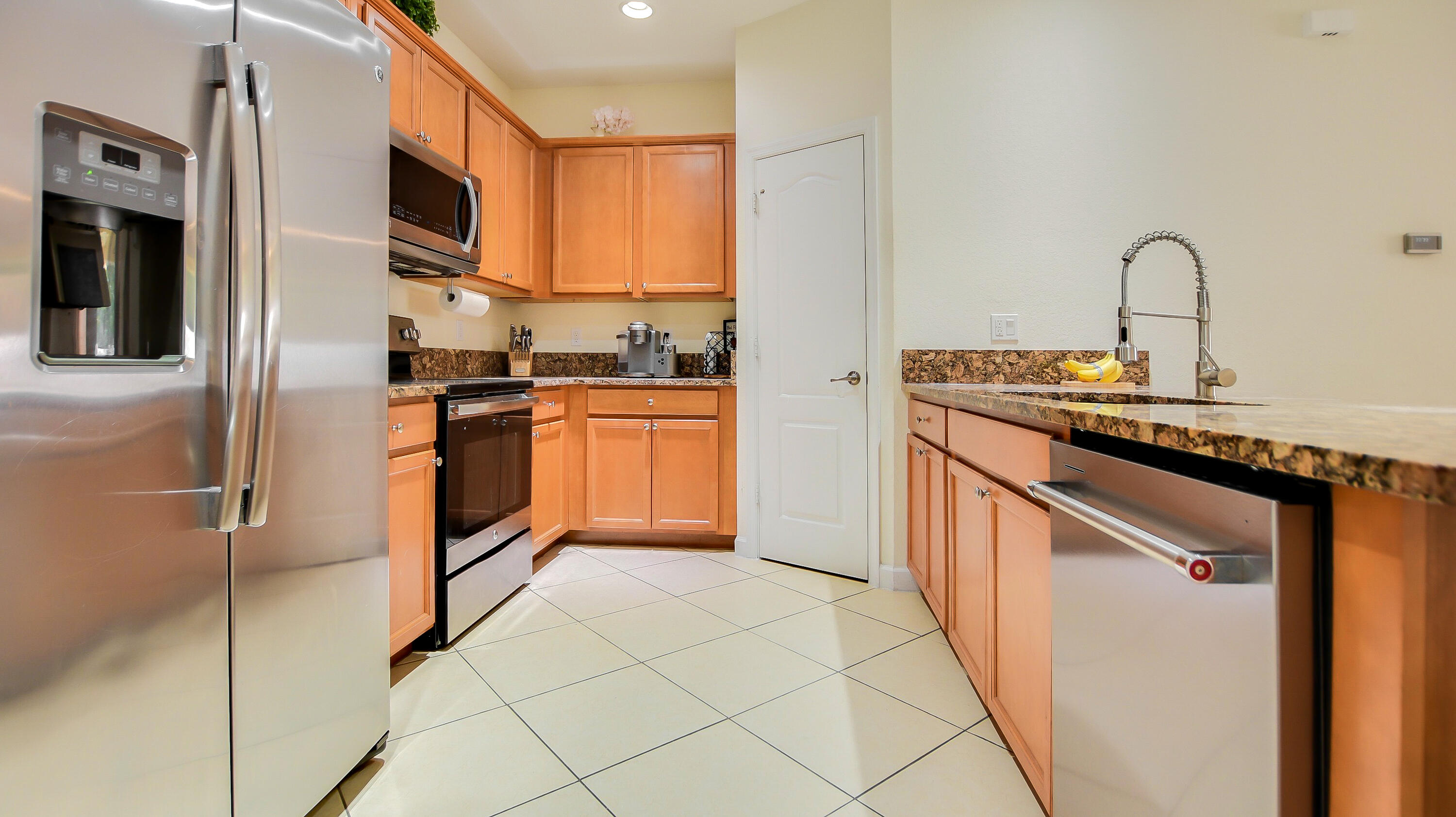 9658 Southwest Purple Martin Way Stuart, FL 34997 - Photo 5 of 35 Kitchen