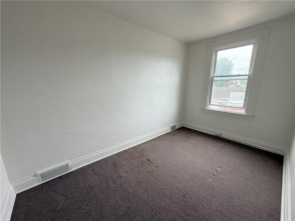 112 Greydon Avenue McKees Rocks, PA 15136 - Photo 12 of 14 an empty room with a window