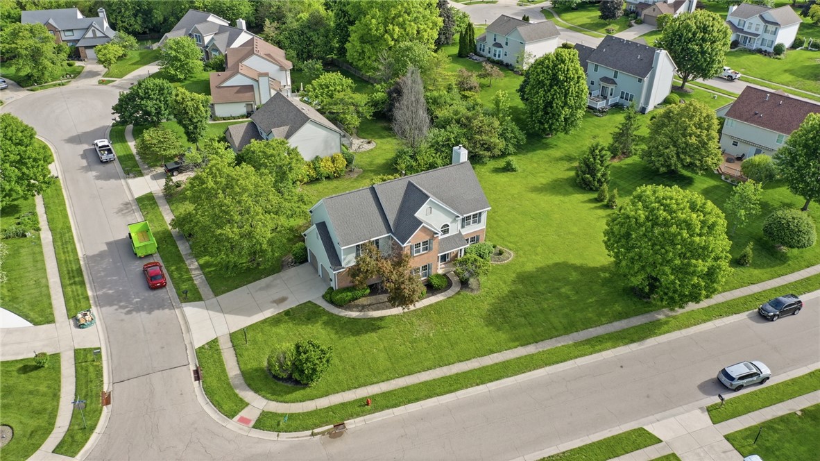 10 Chase Court Springboro, OH 45066 - Photo 71 of 75 An aerial perspective reveals a beautiful home nestled in a lush, green neighborhood.