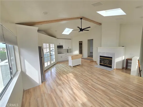 a view of a living room a fireplace with wooden floor