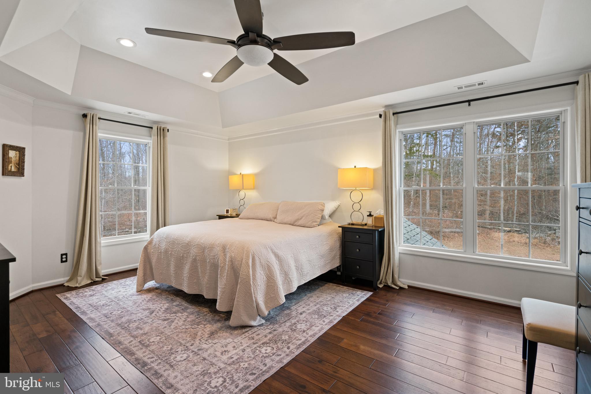 10448 Wheatley School Road Marshall, VA 20115 - Photo 16 of 40 a spacious bedroom with a large bed and a window