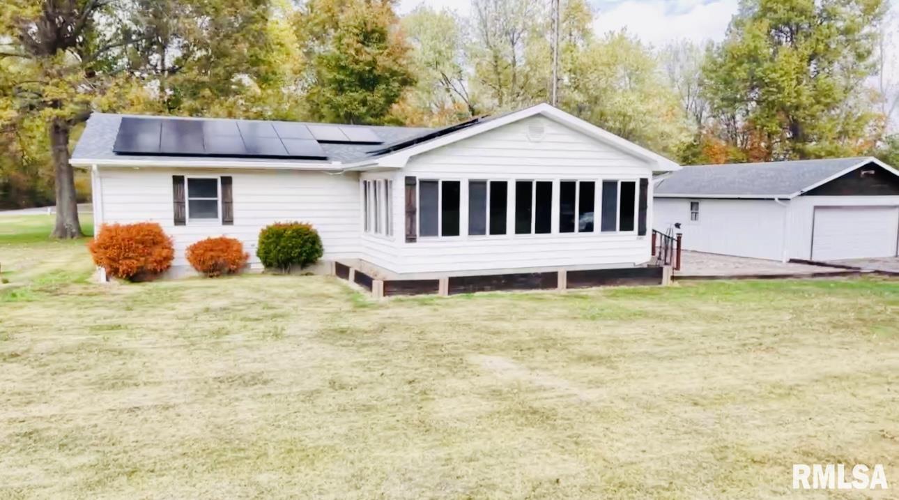 5381 Center Street Mulkeytown, IL 62865 - Photo 1 of 34 a front view of a house with garden