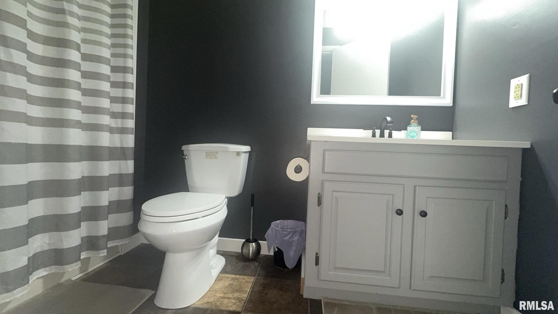 5381 Center Street Mulkeytown, IL 62865 - Photo 32 of 34 a bathroom with a sink toilet and shower