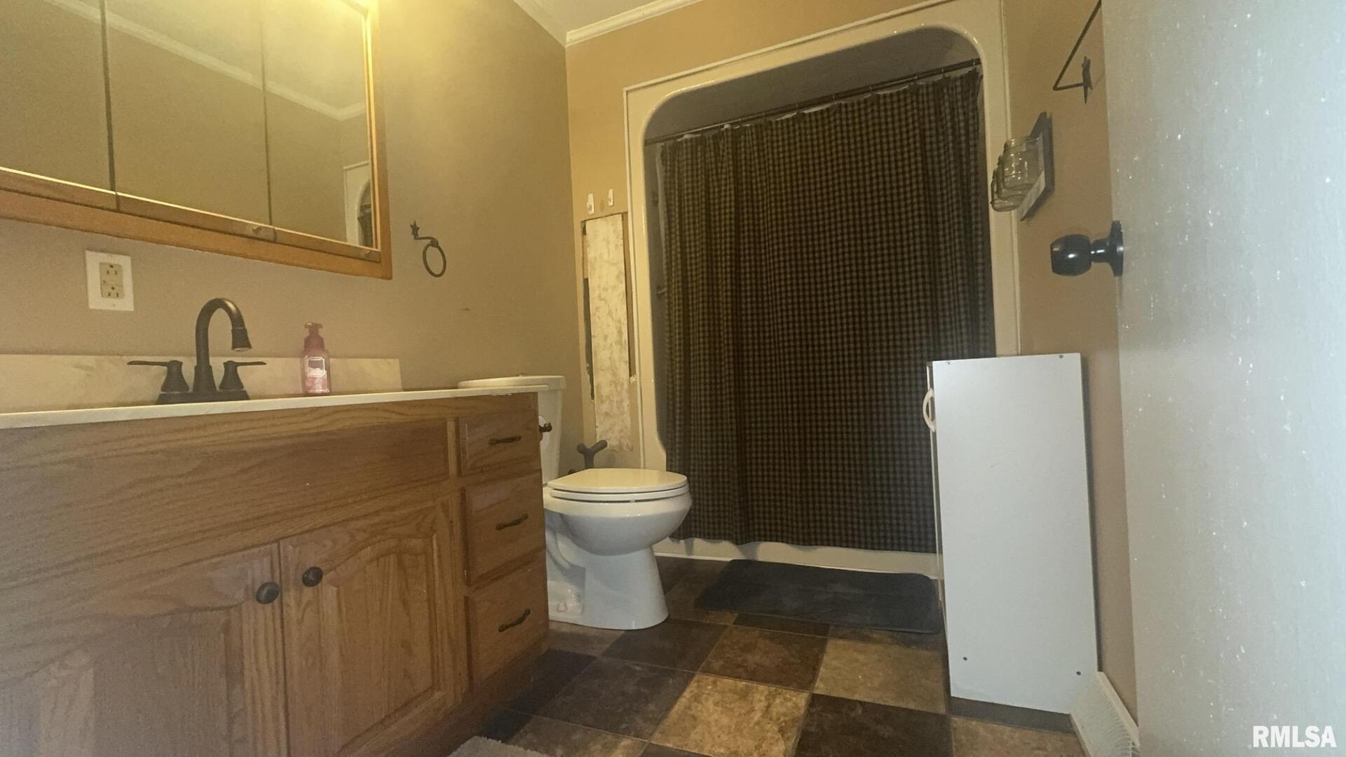 5381 Center Street Mulkeytown, IL 62865 - Photo 33 of 34 a bathroom with a sink toilet and shower