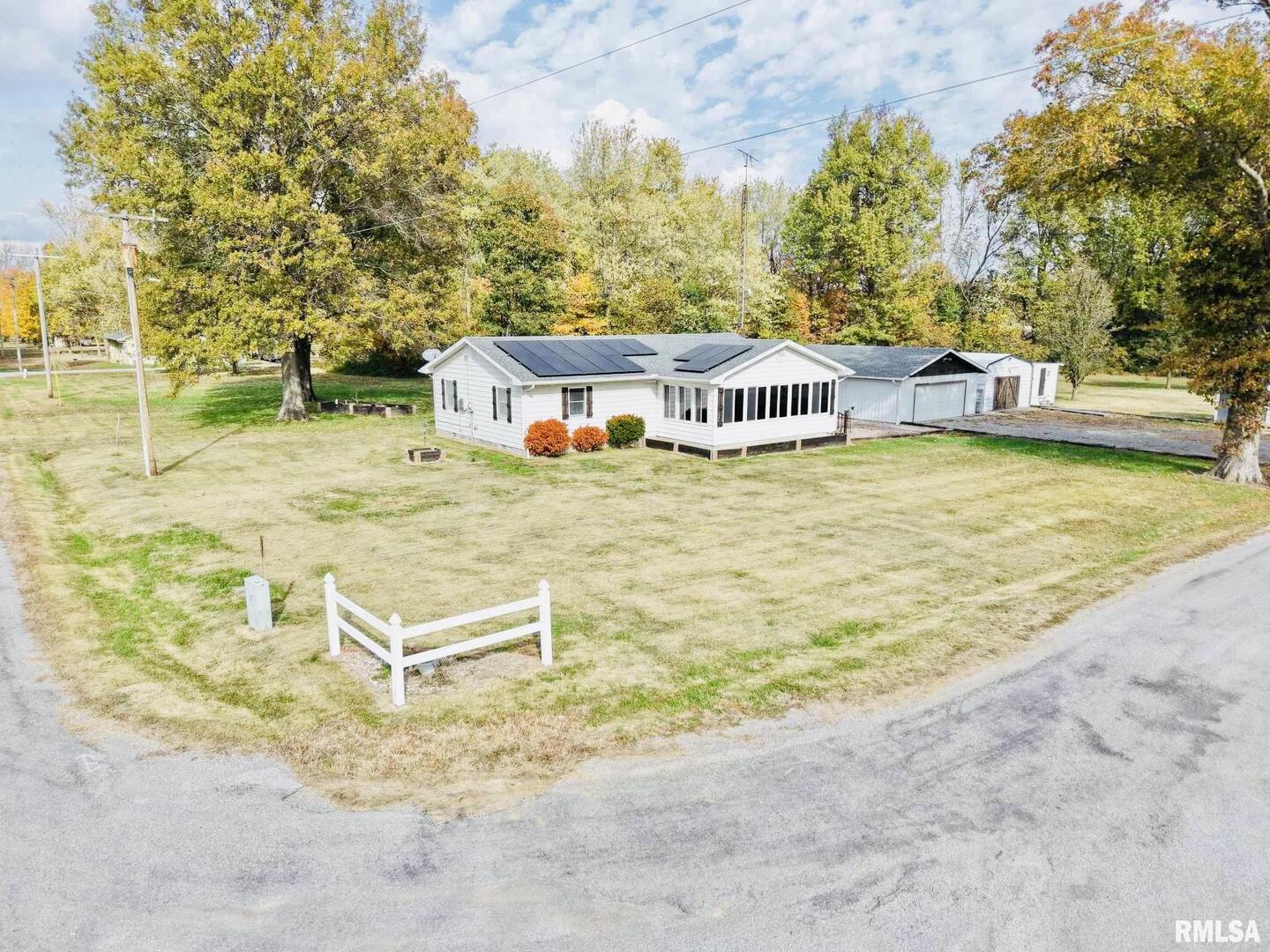 5381 Center Street Mulkeytown, IL 62865 - Photo 4 of 34 an aerial view of a house with swimming pool and an outdoor space