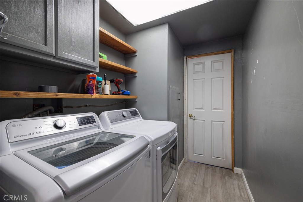 14514 Kennebunk Street Poway, CA 92064 - Photo 14 of 29 a utility room with dryer and washer