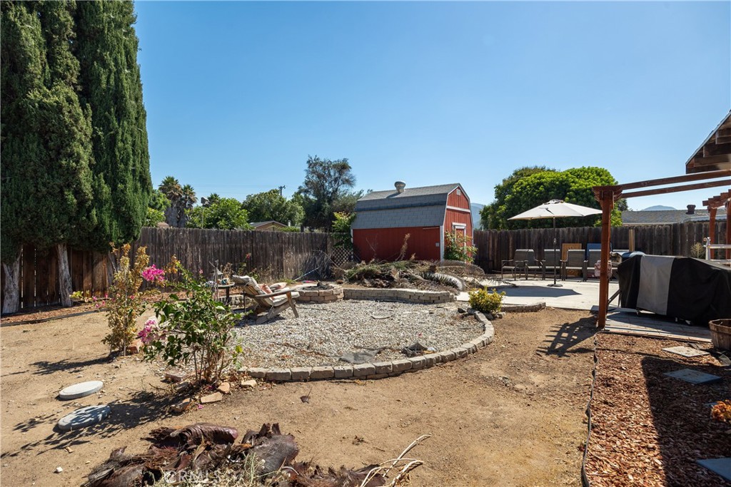 14514 Kennebunk Street Poway, CA 92064 - Photo 17 of 29 a view of a backyard with sitting area