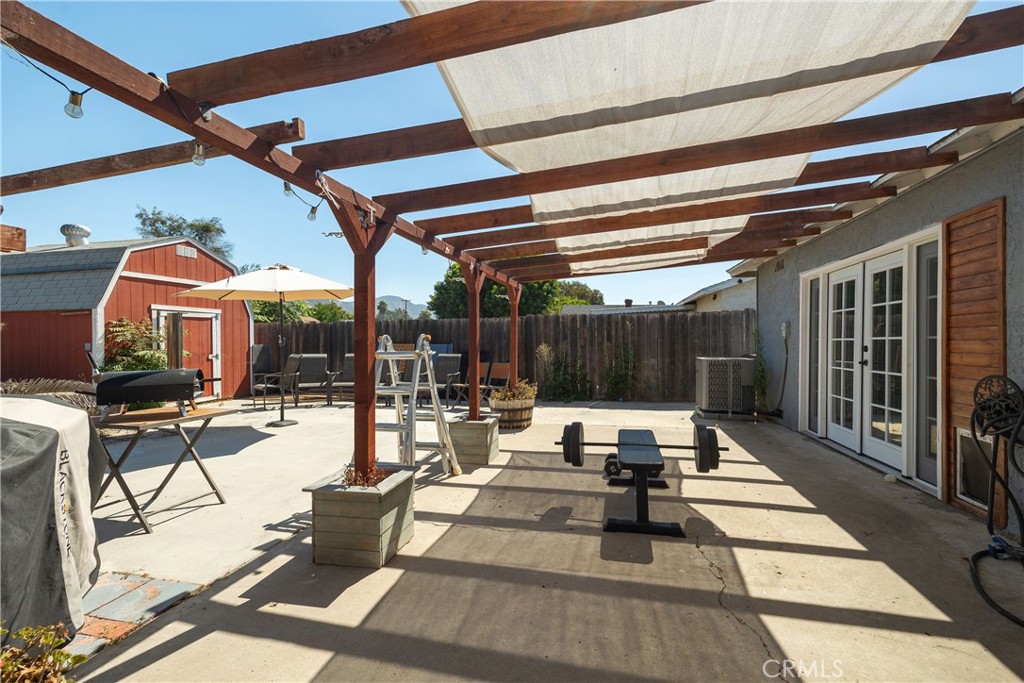 14514 Kennebunk Street Poway, CA 92064 - Photo 18 of 29 a building outdoor space with patio furniture and potted plants