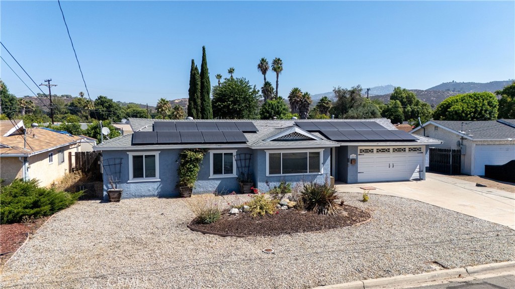 14514 Kennebunk Street Poway, CA 92064 - Photo 23 of 29 a view of a house with a backyard