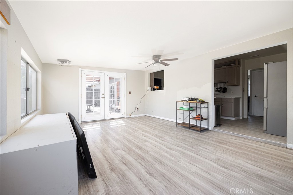 14514 Kennebunk Street Poway, CA 92064 - Photo 8 of 29 a living room with furniture and large windows