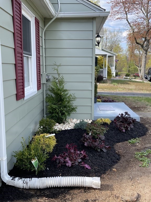 52 Mandalay Road Springfield, MA 01118 - Photo 2 of 24 a view of a backyard with plants