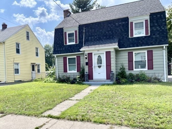 52 Mandalay Road Springfield, MA 01118 - Photo 23 of 24 a view of a brick house with a yard