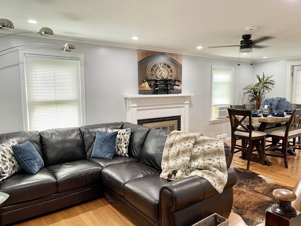 52 Mandalay Road Springfield, MA 01118 - Photo 9 of 24 a living room with furniture and a fireplace