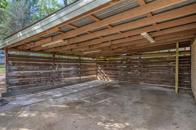 a view of outdoor space with wooden ceiling