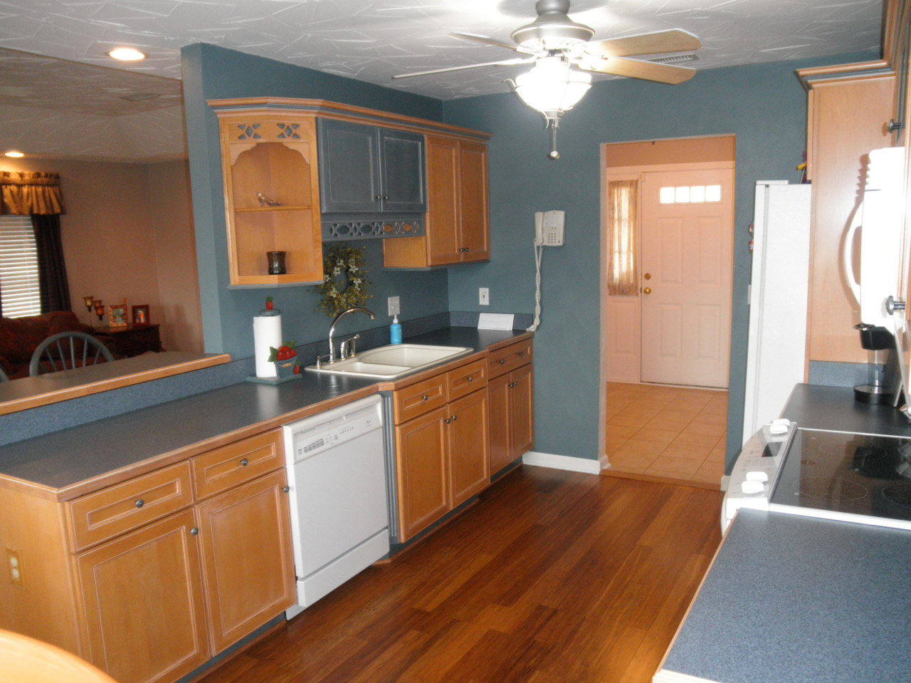 9316 Stewartsville Road Moneta, VA 24121 - Photo 14 of 34 a kitchen with a sink cabinets and wooden floor