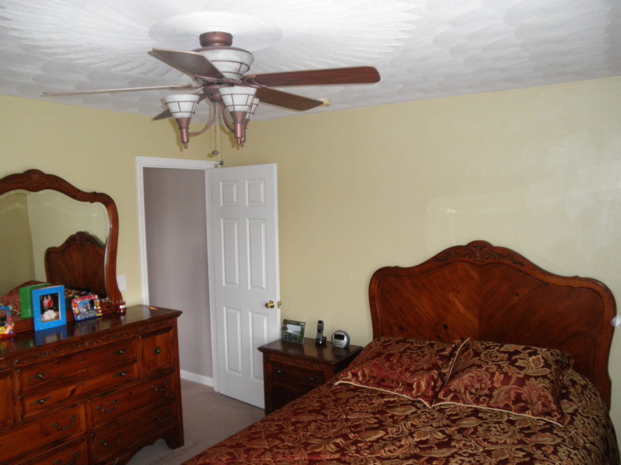 9316 Stewartsville Road Moneta, VA 24121 - Photo 23 of 34 a bedroom with a bed and wooden floor