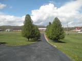 9316 Stewartsville Road Moneta, VA 24121 - Photo 32 of 34 a view of a big yard with large trees