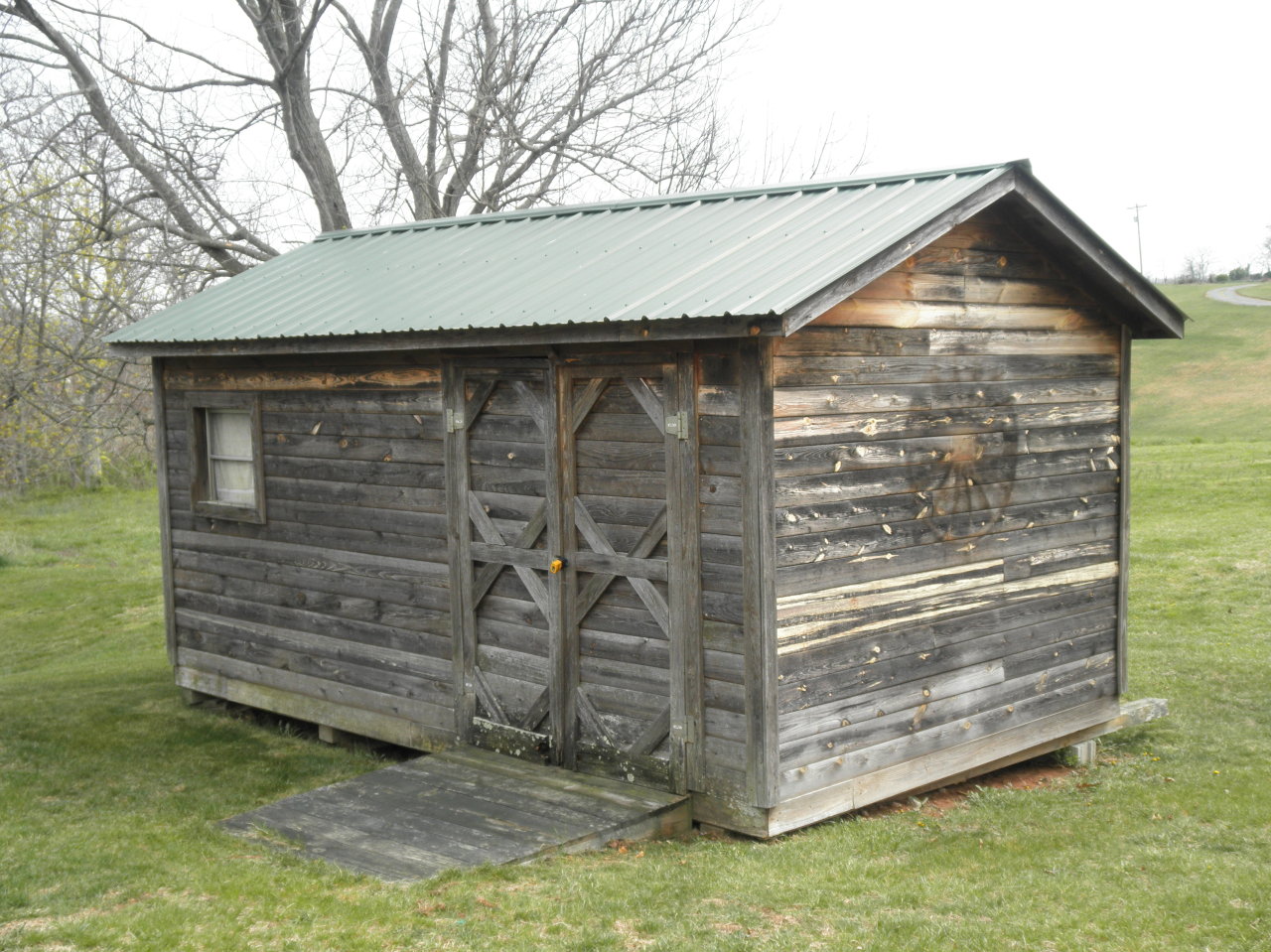 9316 Stewartsville Road Moneta, VA 24121 - Photo 34 of 34 a view of wooden house with a small yard
