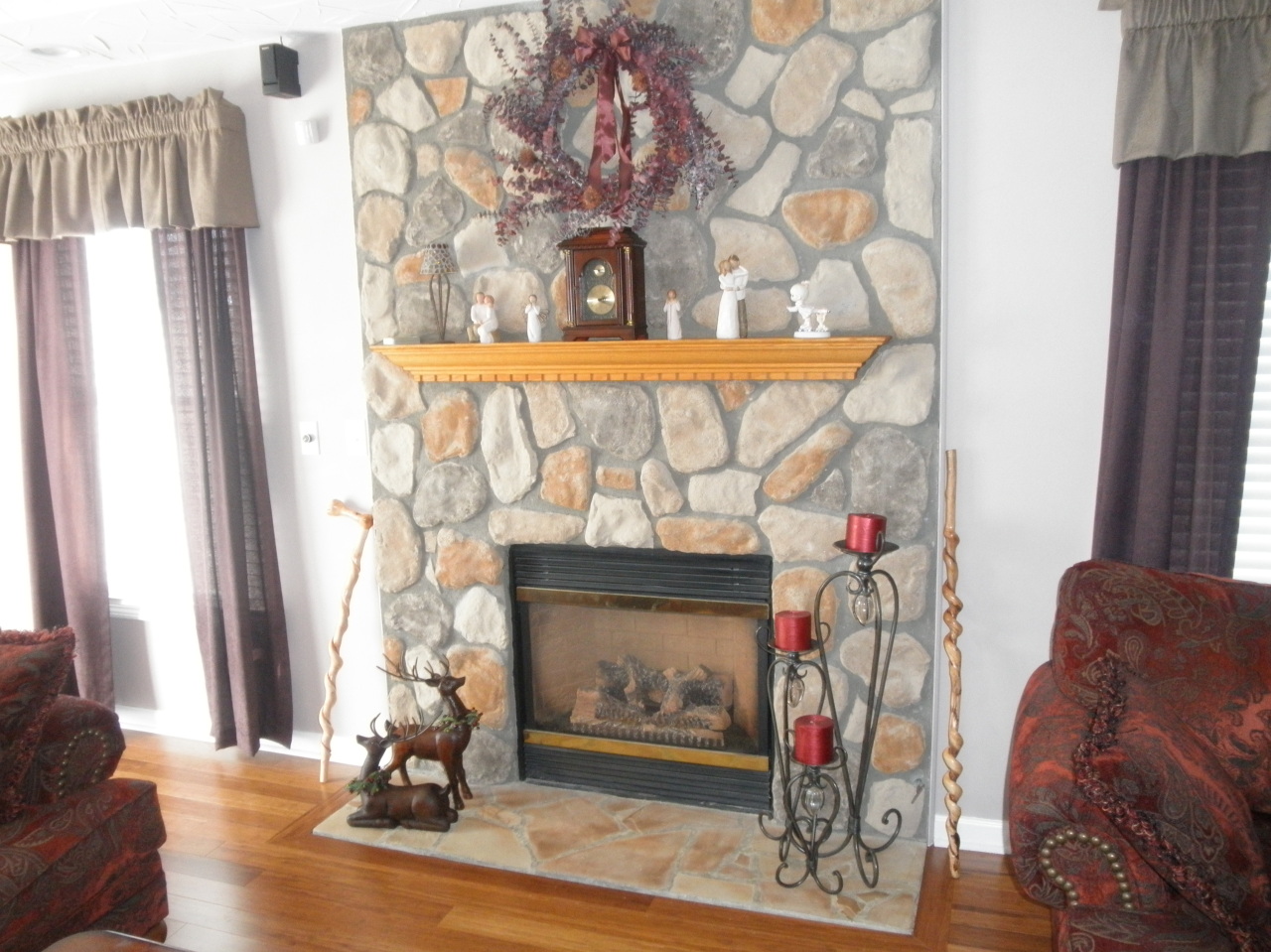 9316 Stewartsville Road Moneta, VA 24121 - Photo 8 of 34 a living room with a fireplace with wooden floor