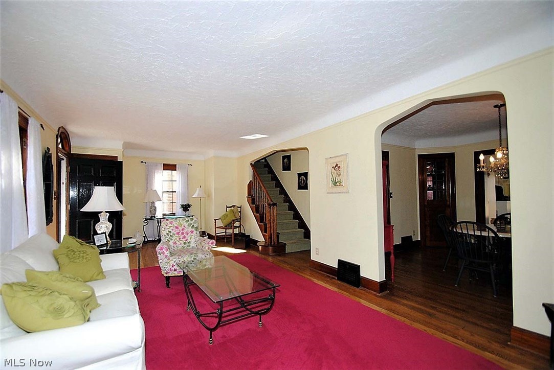 2464 Fenwick Road Cleveland, OH 44118 - Photo 23 of 23 OPEN FLOOR PLAN. LIVING ROOM FLOWS INTO DINING ROOM AND KITCHEN. GRACEFUL STAIRWAY TO SECOND FLOOR