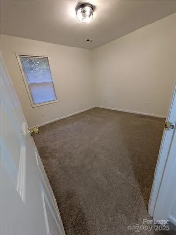 an empty room with a door