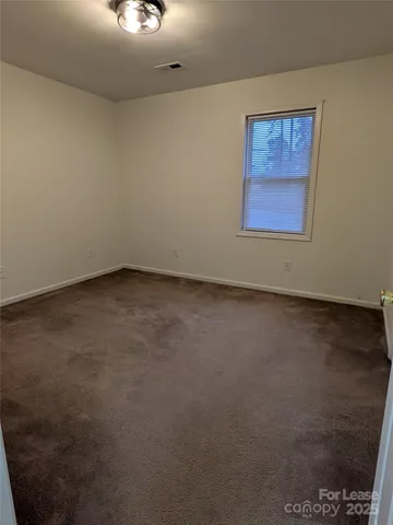 an empty room with a workbench