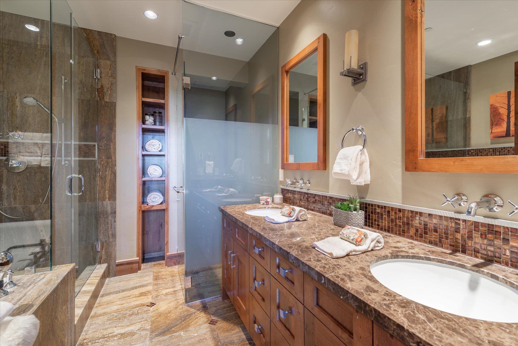 14053 Trailside Loop Truckee, CA 96161 - Photo 12 of 21 a bathroom with a granite countertop double vanity sink mirror and shower