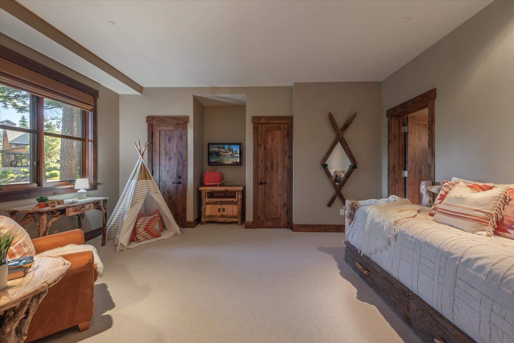 14053 Trailside Loop Truckee, CA 96161 - Photo 16 of 21 a bed room with a bed and a desk