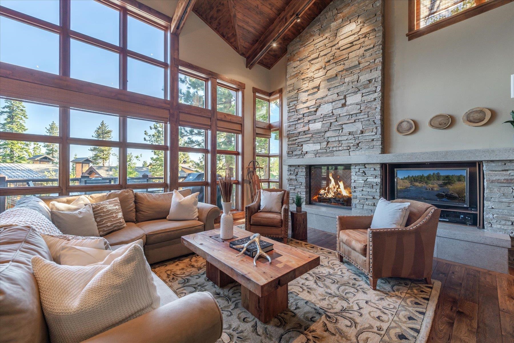 14053 Trailside Loop Truckee, CA 96161 - Photo 7 of 21 a living room with furniture and a fireplace